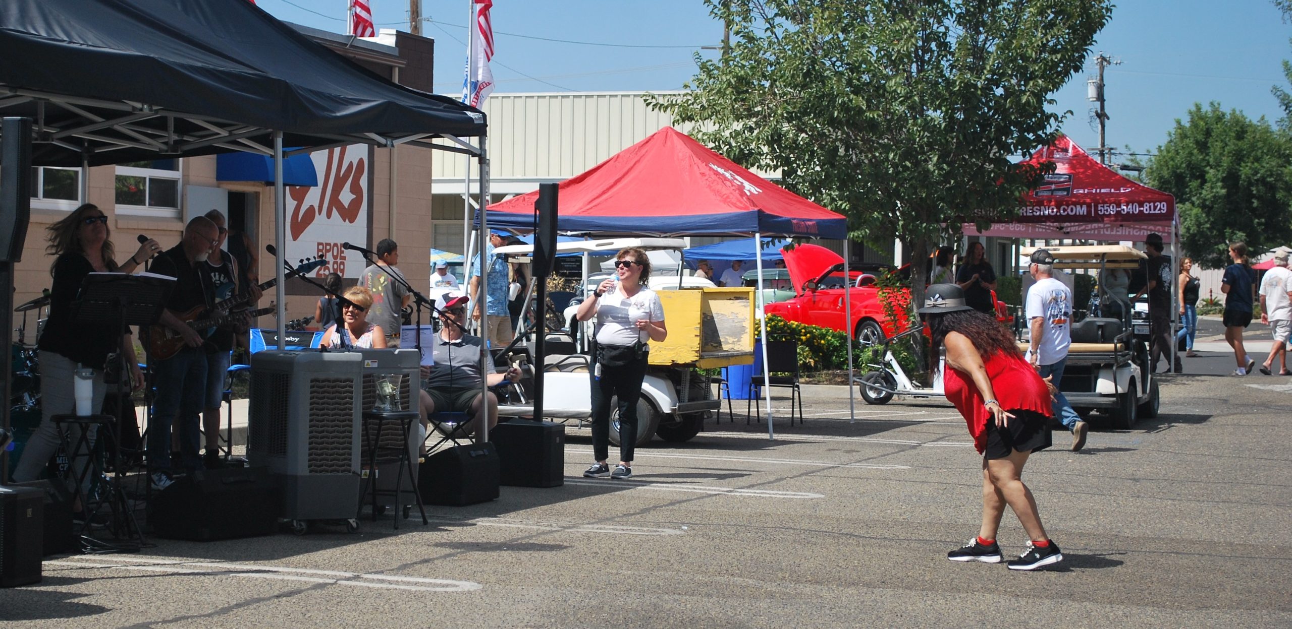 Mid Life Crisis Clovis band performs "The Boys of Summer" at the Hot August Daze car show (Photo by Hannah-Grace Leece, Clovis Roundup).