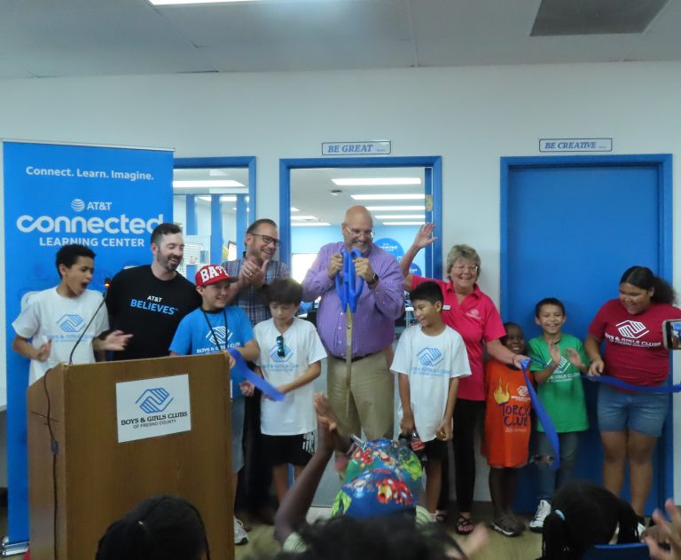 Officials cutting the ribbon at the opening for the "Connected Learning Center" at the Boys & Girls Club of Clovis (Photo by Hannah-Grace Leece, Clovis Roundup).