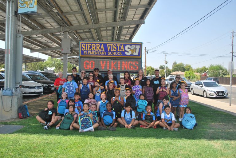 A few kids from Michael Williamson's class at Sierra Vista Elementary, excited about the backpacks they received from the Clovis Elks Lodge (photo by Hannah-Grace Leece, Clovis Roundup).