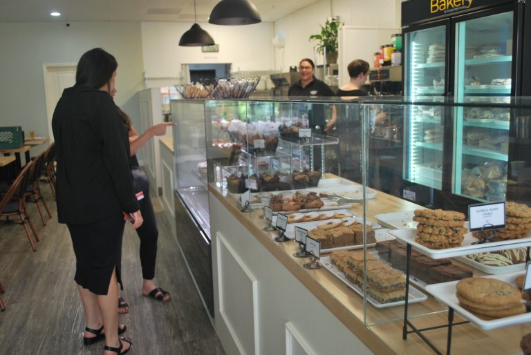 Customers at The Bakery by Indulge Right decide on what gluten-free desserts to purchase (photo by Hannah-Grace Leece, Clovis Roundup).