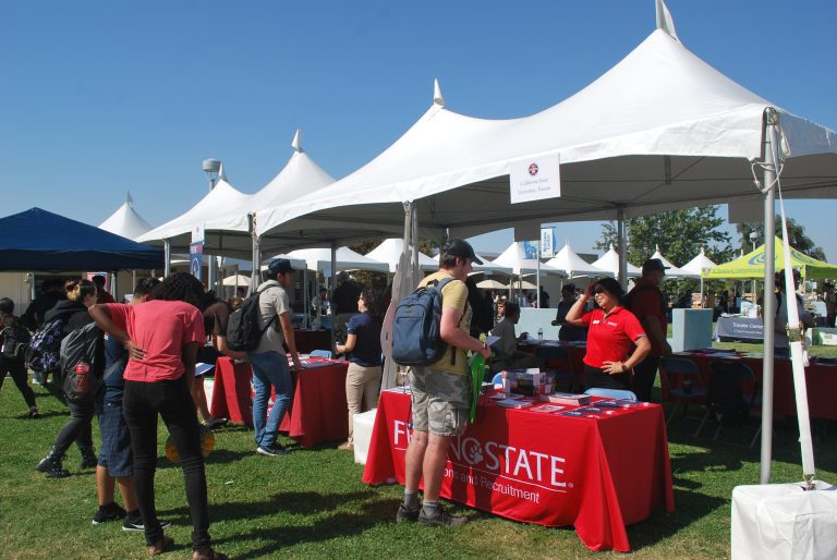 Clovis Community College students check out the Fresno State tables at the Transfer Day Festival on October 1st, 2024 (photo by Hannah-Grace Leece, Clovis Roundup).