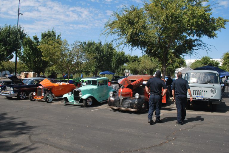 Attendees of the Mustangs Club Car Show check out the various classic cars for show on October 5th, 2024 (photo by Hannah-Grace Leece, Clovis Roundup).